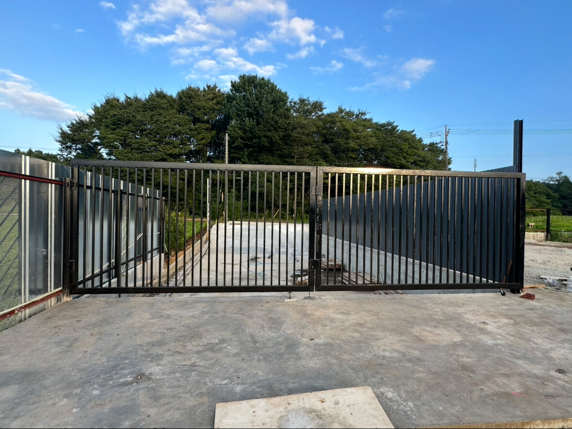 Chiba Logistics & Industrial Yard — metal entrance gate