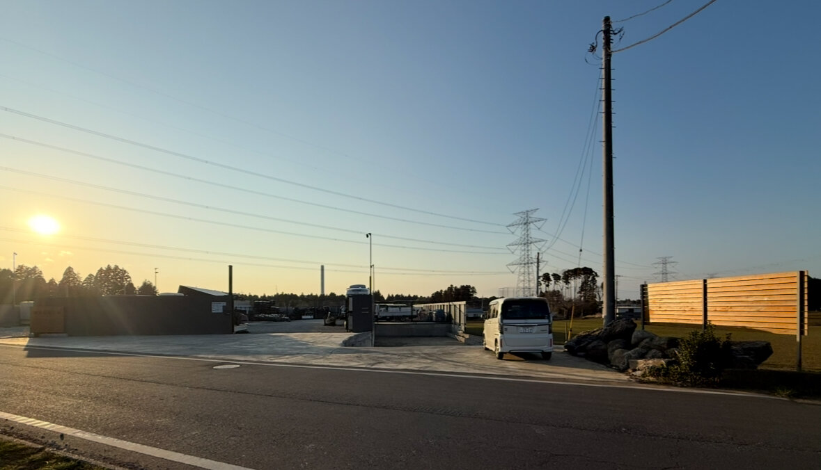 Chiba Logistics & Industrial Yard — road outside the yard at sunset