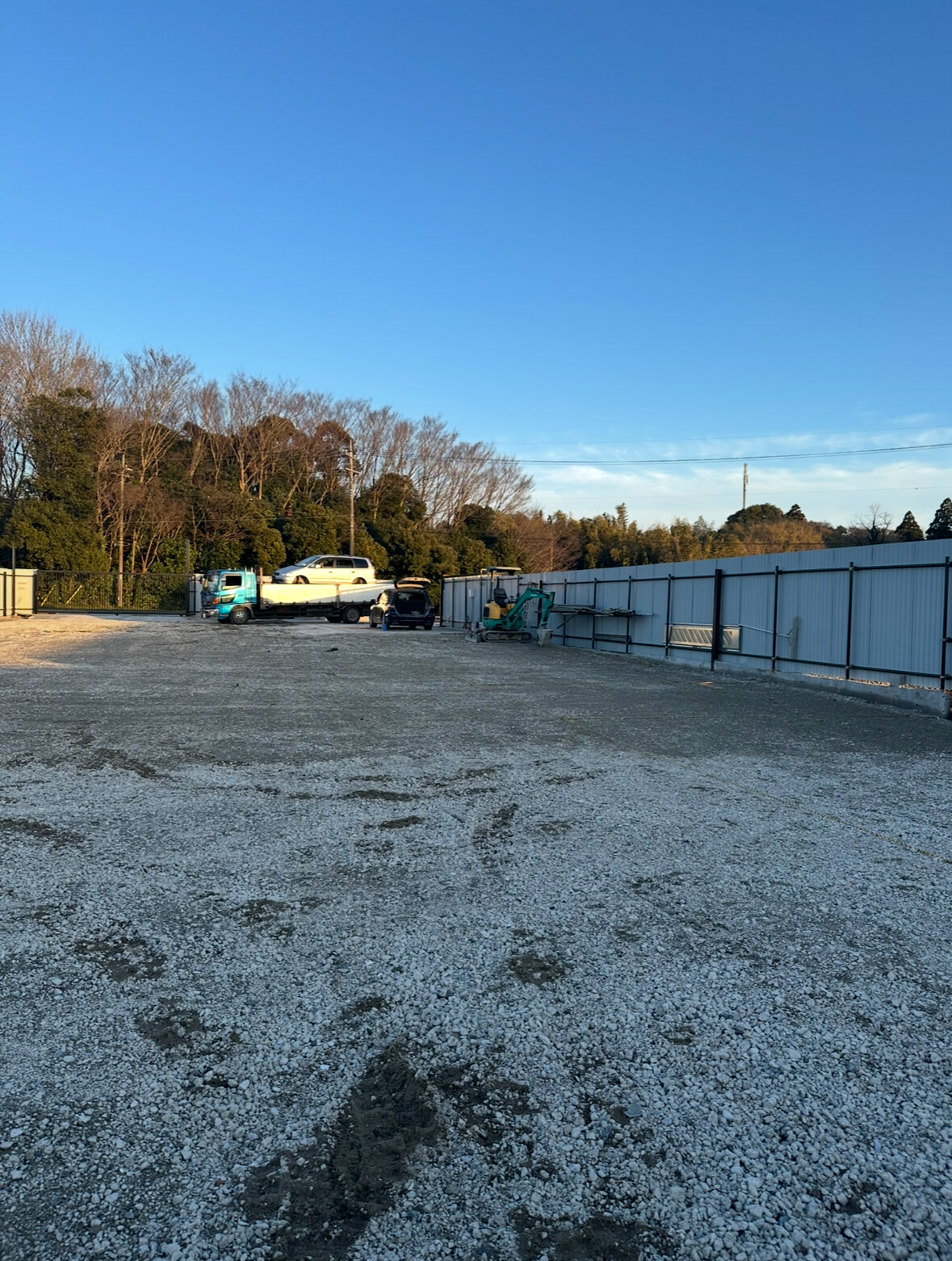 Chiba Logistics & Industrial Yard — open gravel yard and perimeter fence