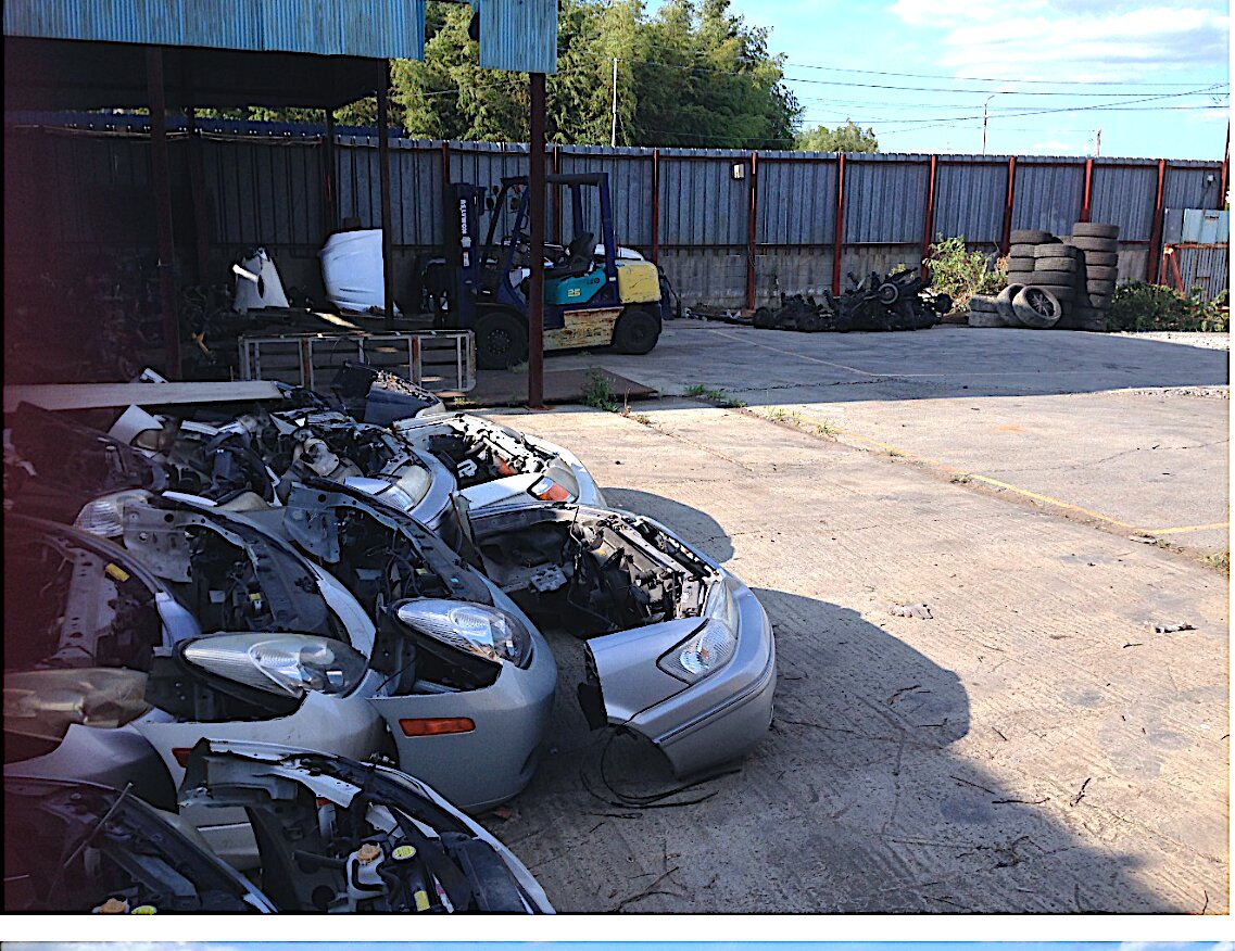 Dismantled vehicle bodies in the work yard