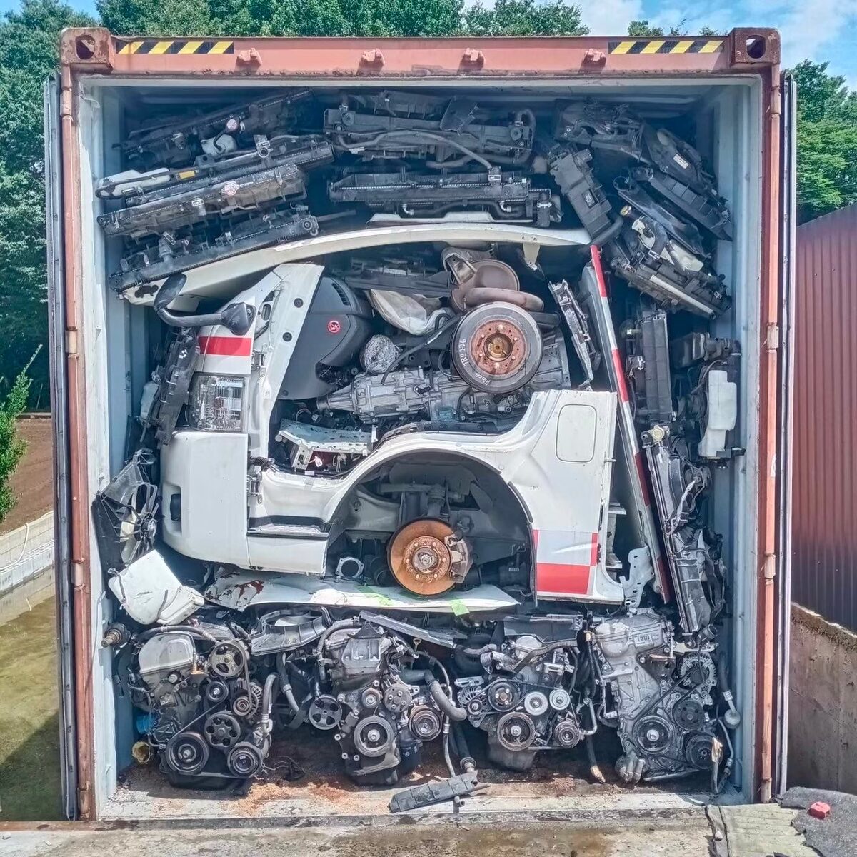 Used SUV secured inside a shipping container