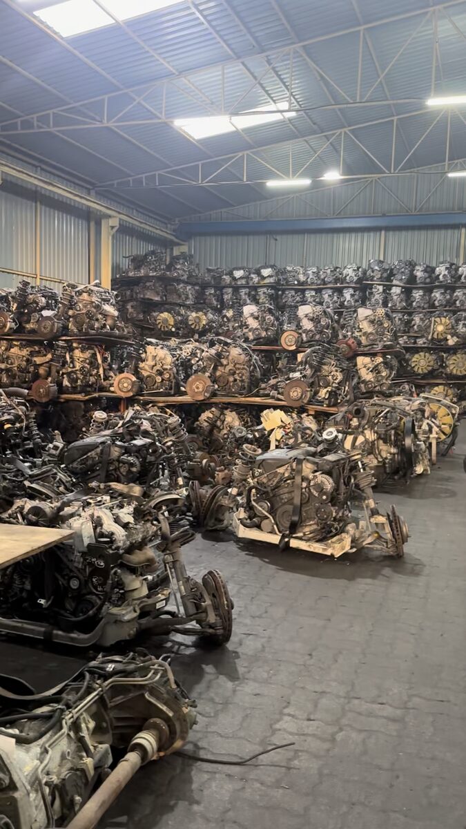 Used engines and parts stored in a warehouse
