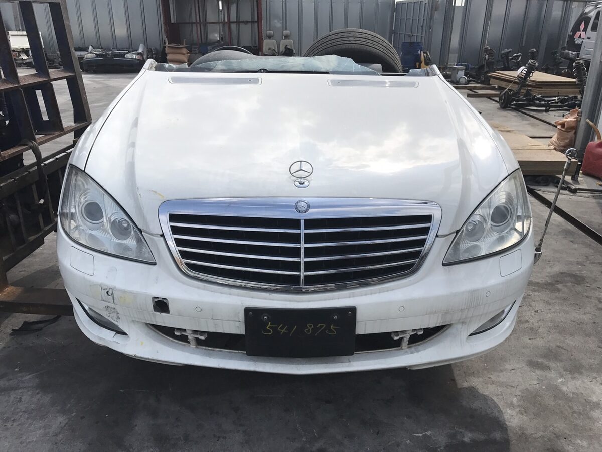 White Mercedes-Benz car parked outdoors